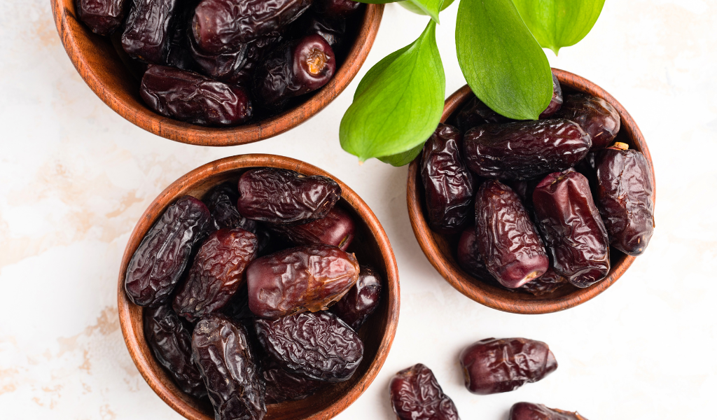 medjool dates with wooden bowl